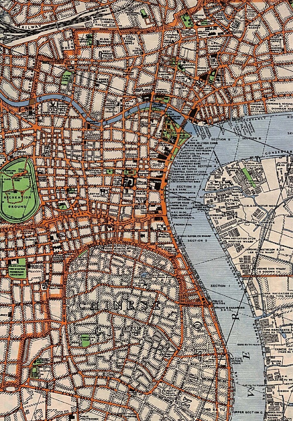 Vintage detaljerad karta över Shanghai stad som visar kinesiska staden, rekreationsområde, hamnar, järnvägar och olika landmärken.
