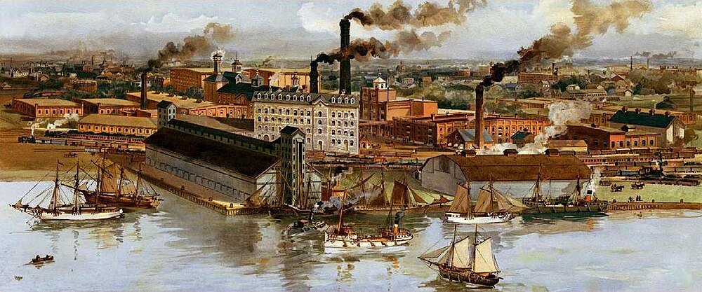 Historisk industriell vattenfront med fabriker och fartyg Historisk industriell vattenscen med fabriker, skorstenar som avger rök och segelfartyg på vattnet