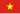 Röd flagga med en stor gul stjärna i mitten, symboliserar Vietnams nationalflagga, representerar patriotism och enhet.